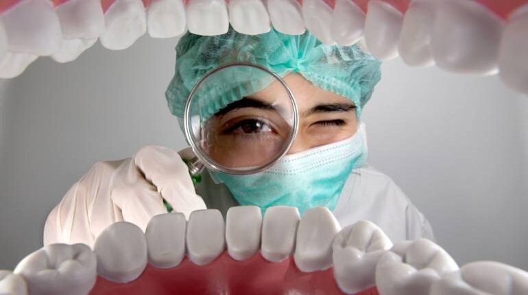 Oral cancer prevention, poor oral hygiene, best dentist in Surat Vesu, Dr. Panseriya's Dental & Implant Clinic, dental implants in Surat Vesu, oral cancer symptoms, gum disease and oral cancer, plaque and tartar buildup, smoking and oral cancer, alcohol and oral health, dental checkups in Surat, fluoride toothpaste benefits, mouth sores and cancer risk, healthy diet for oral health, UV protection for lips, dental hygiene tips, periodontal disease, early detection of oral cancer, dental care in Surat, best dental clinic in Surat